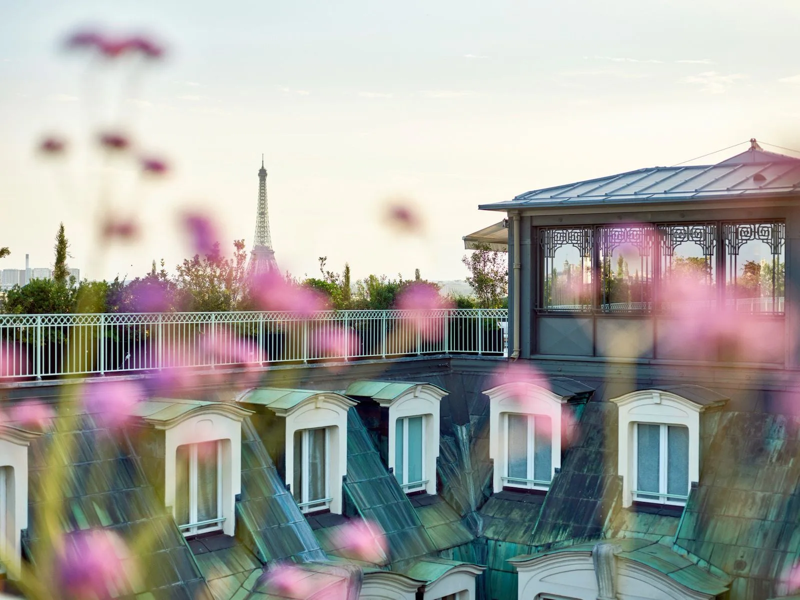 The rooftop terrace of the Belle Etoile Penthouse Suite at Le Meurice, with the Eiffel Tower in view.