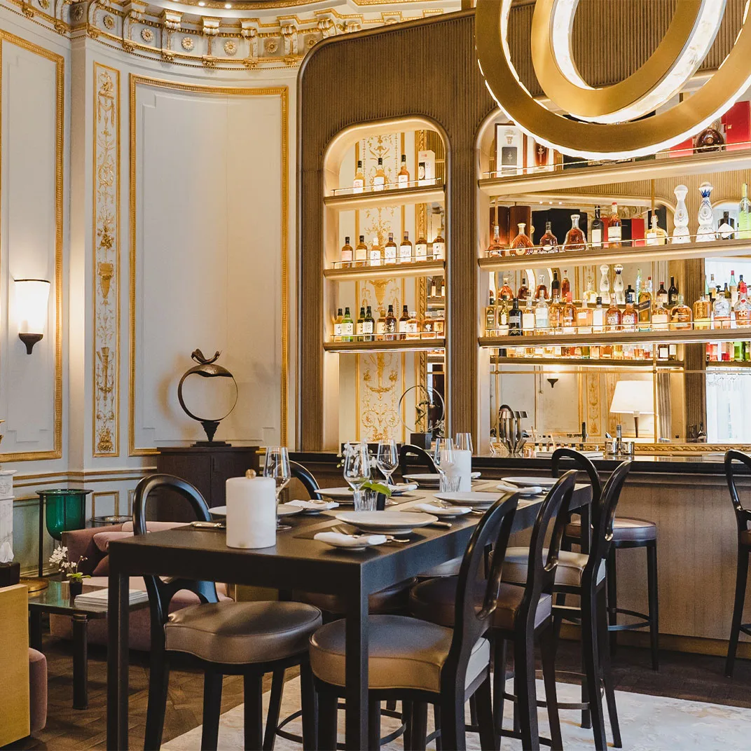 Bar Jean Goujon, its gold-leaf ceiling molding original to the 1908 mansion.