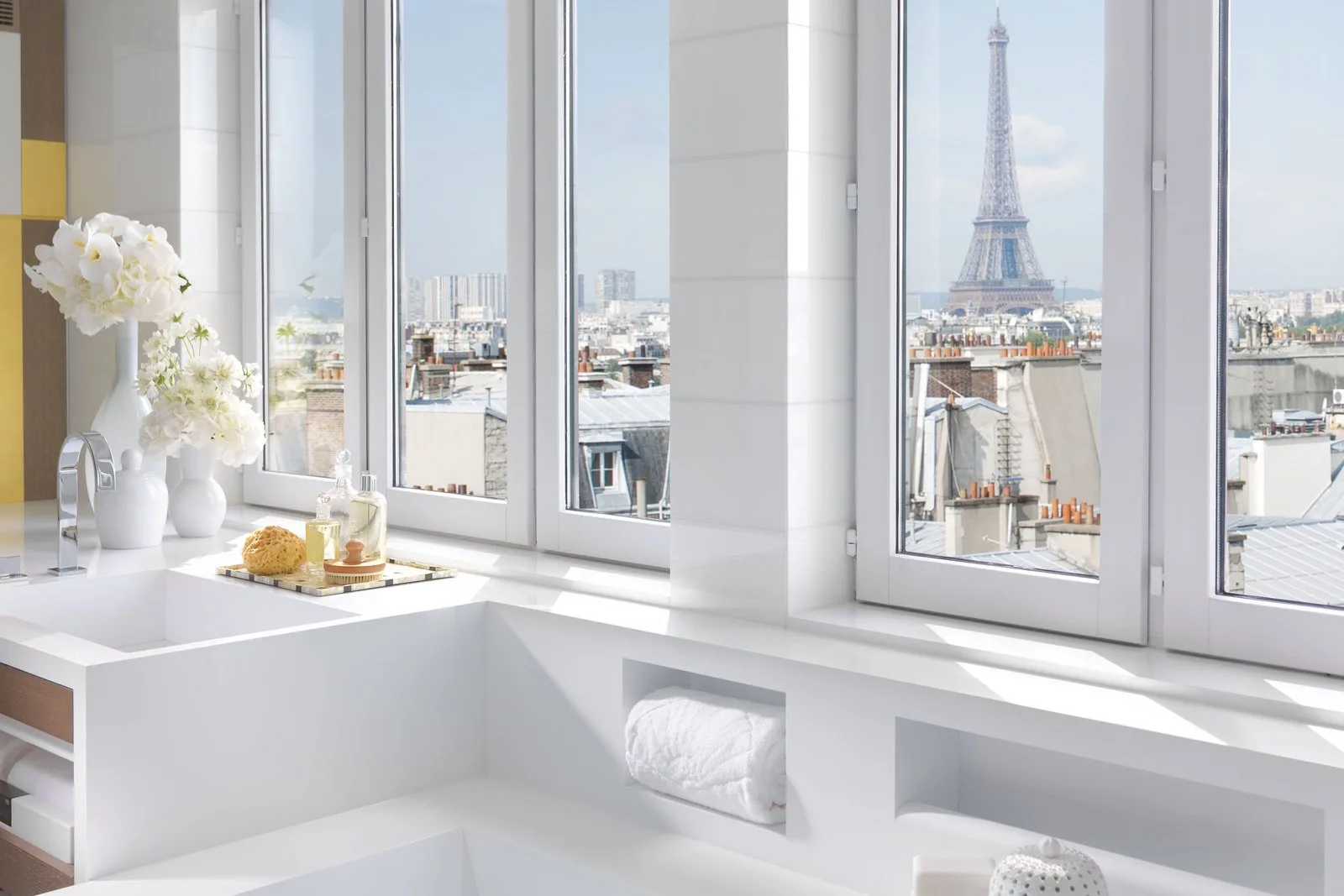 A direct Eiffel Tower view from the bathroom of the Mandarin Penthouse Suite.