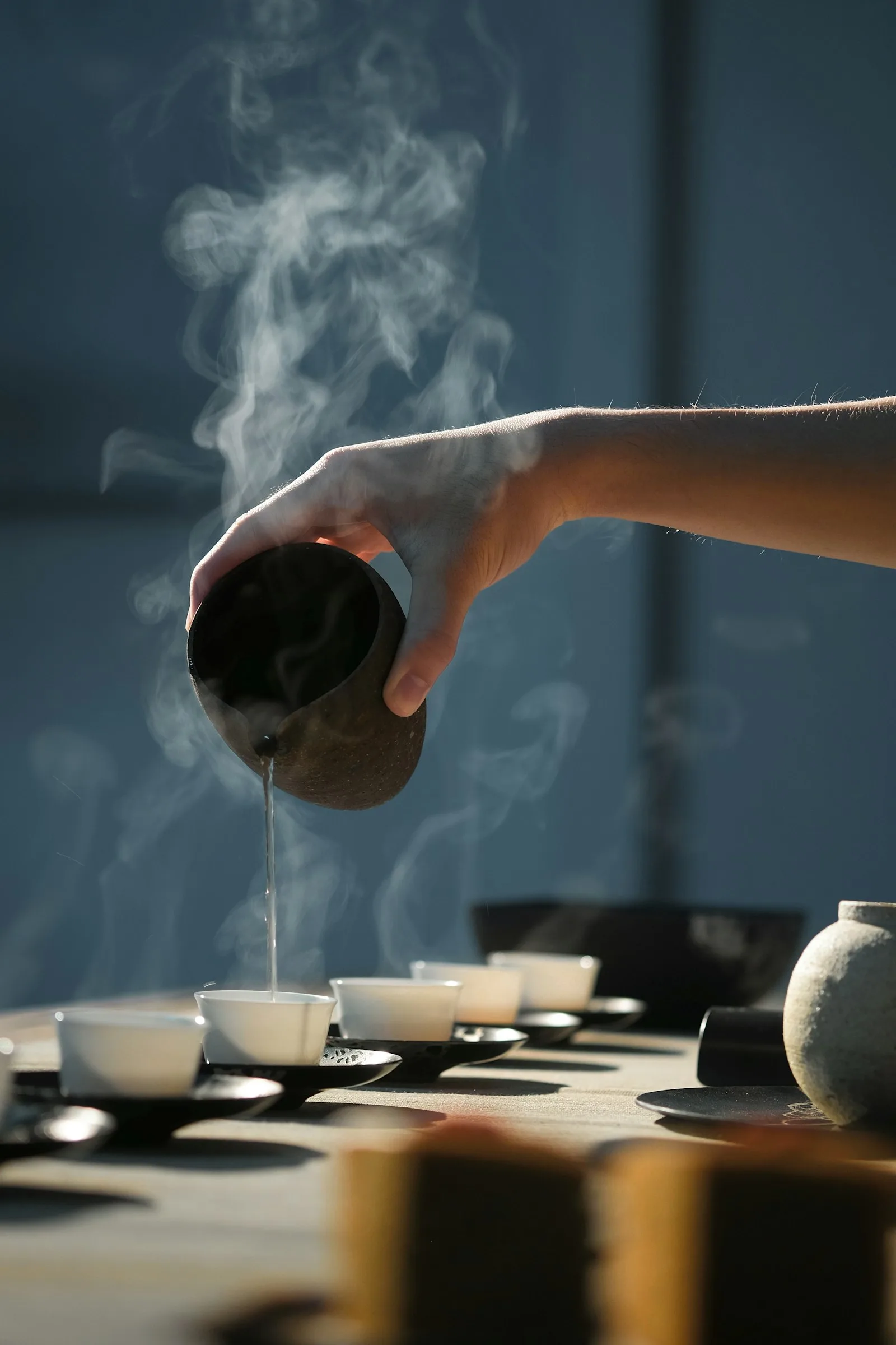 Hot water being poured for a traditional Japanese tea ceremony.