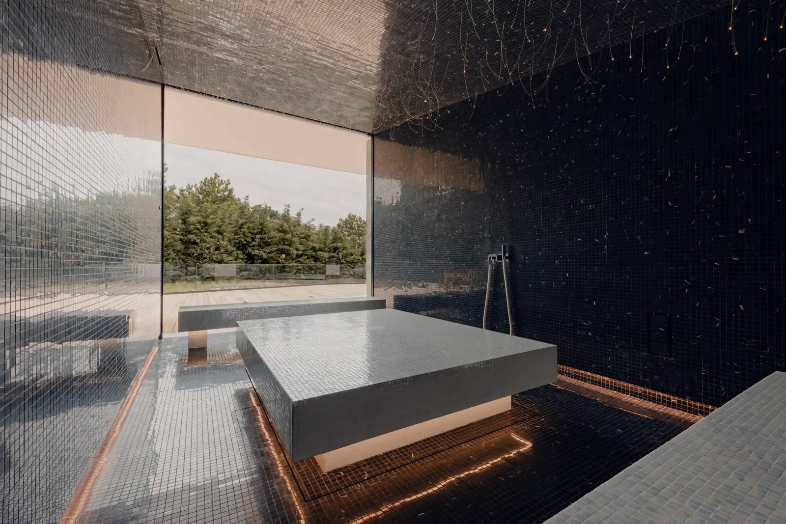 The villa’s spa treatment room, with mosaic tiling and a heated stone table.