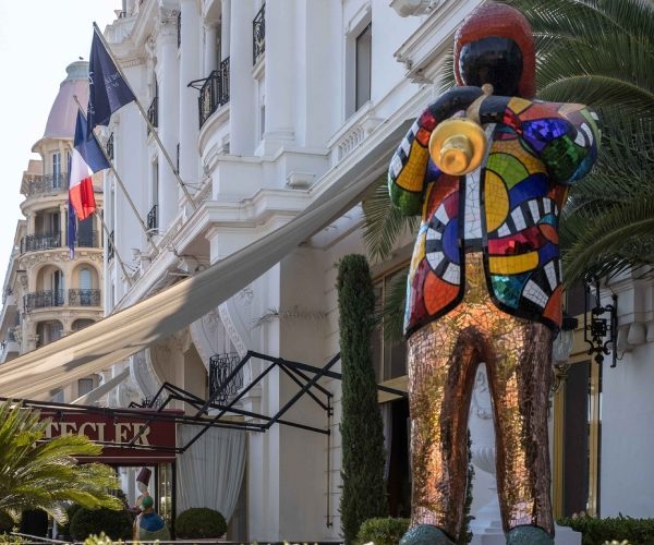 Niki de Saint Phalle's mosaic sculpture Miles Davis stands outside the hotel, facing the sea.